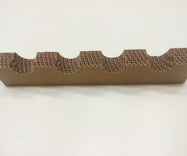 Shape cuts and cut-outs of multi-layered corrugated cardboard